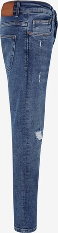 Skinny Jeans di Karl Kani in blu