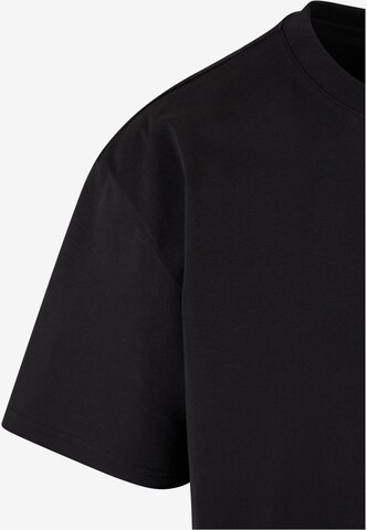 Karl Kani Skjorte 'Essential' i svart