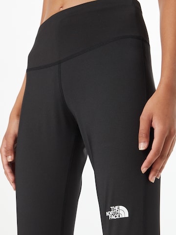 Skinny Pantalon de sport THE NORTH FACE en noir