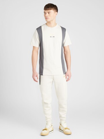 T-Shirt 'AIR' Nike Sportswear en blanc