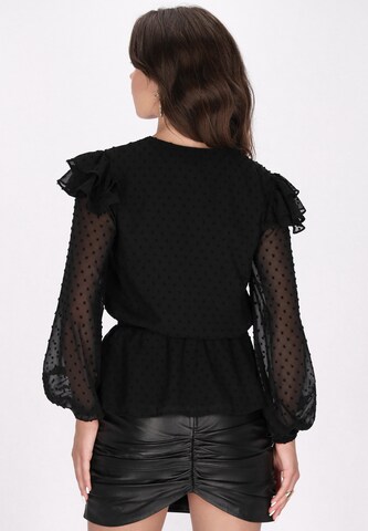 Camicia da donna di faina in nero