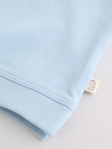 Set Next en bleu
