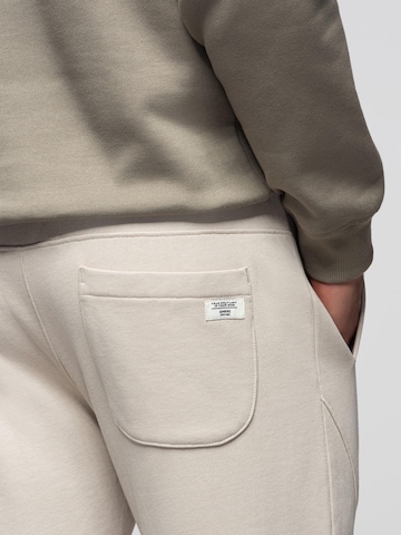 Effilé Pantalon de sport Ombre en gris