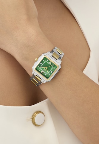 Gc Analogt ur i guld