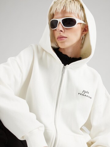 Pegador - Sudadera con cremallera 'YUNTA' en blanco