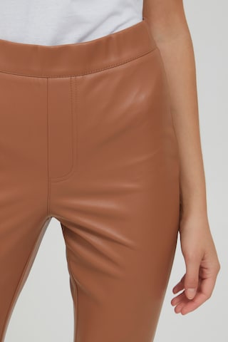 Oxmo Slim fit Leggings 'PAULINE' in Brown