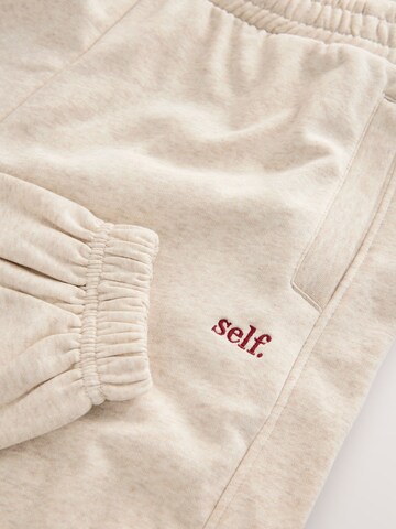 self. Tapered Broek in Beige