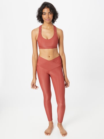 Onzie Skinny Workout Pants in Red