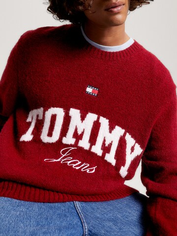 Pull-over Tommy Jeans en rouge