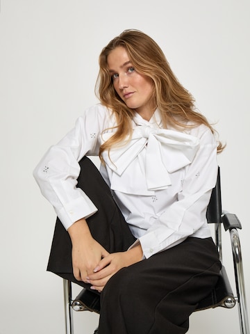 Top 'Lumi' di minus in bianco