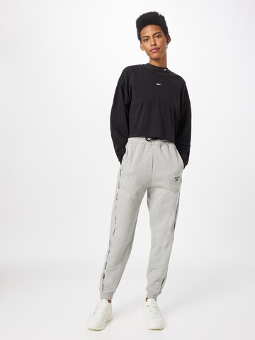 Reebok Tapered Sports trousers in Grey