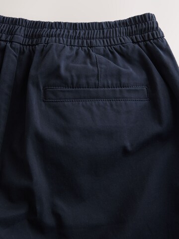 Next Ohlapna forma Chino hlače | modra barva