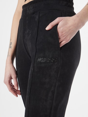 GUESS Tapered Παντελόνι φόρμας 'EUPHEMIA' σε μαύρο